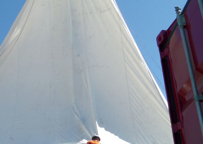 Securing the canopy over the driller’s work area.